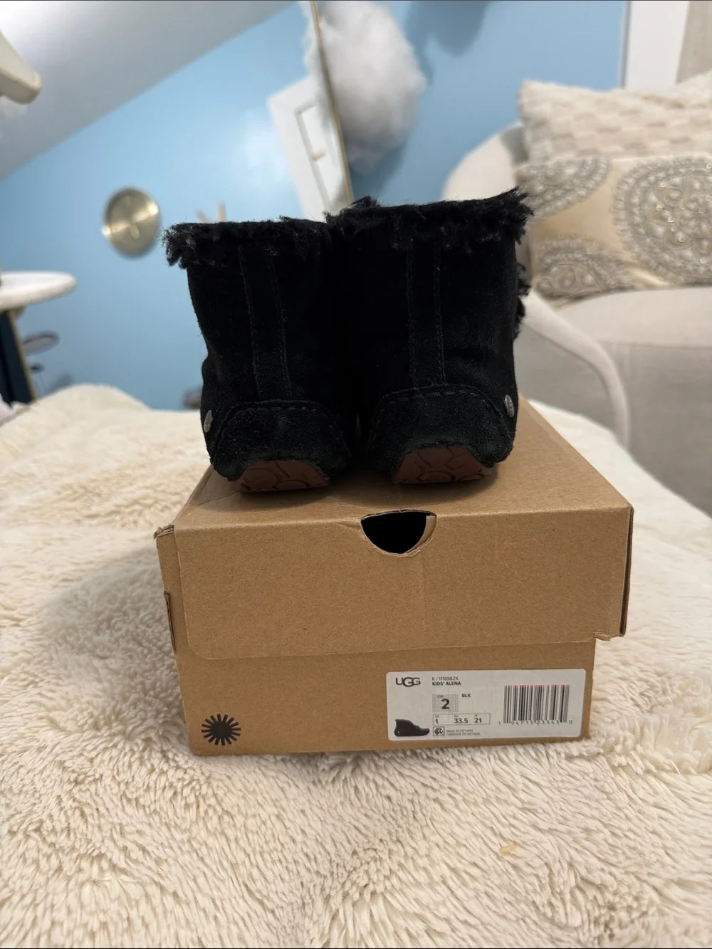 UGG Kids Black Suede Moccasin Slippers with Bow Accent